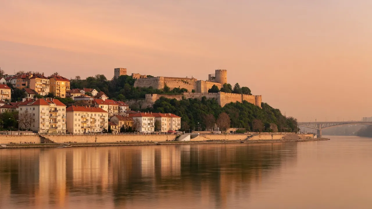 Belgrade's old town and fortress above the river at sunset
